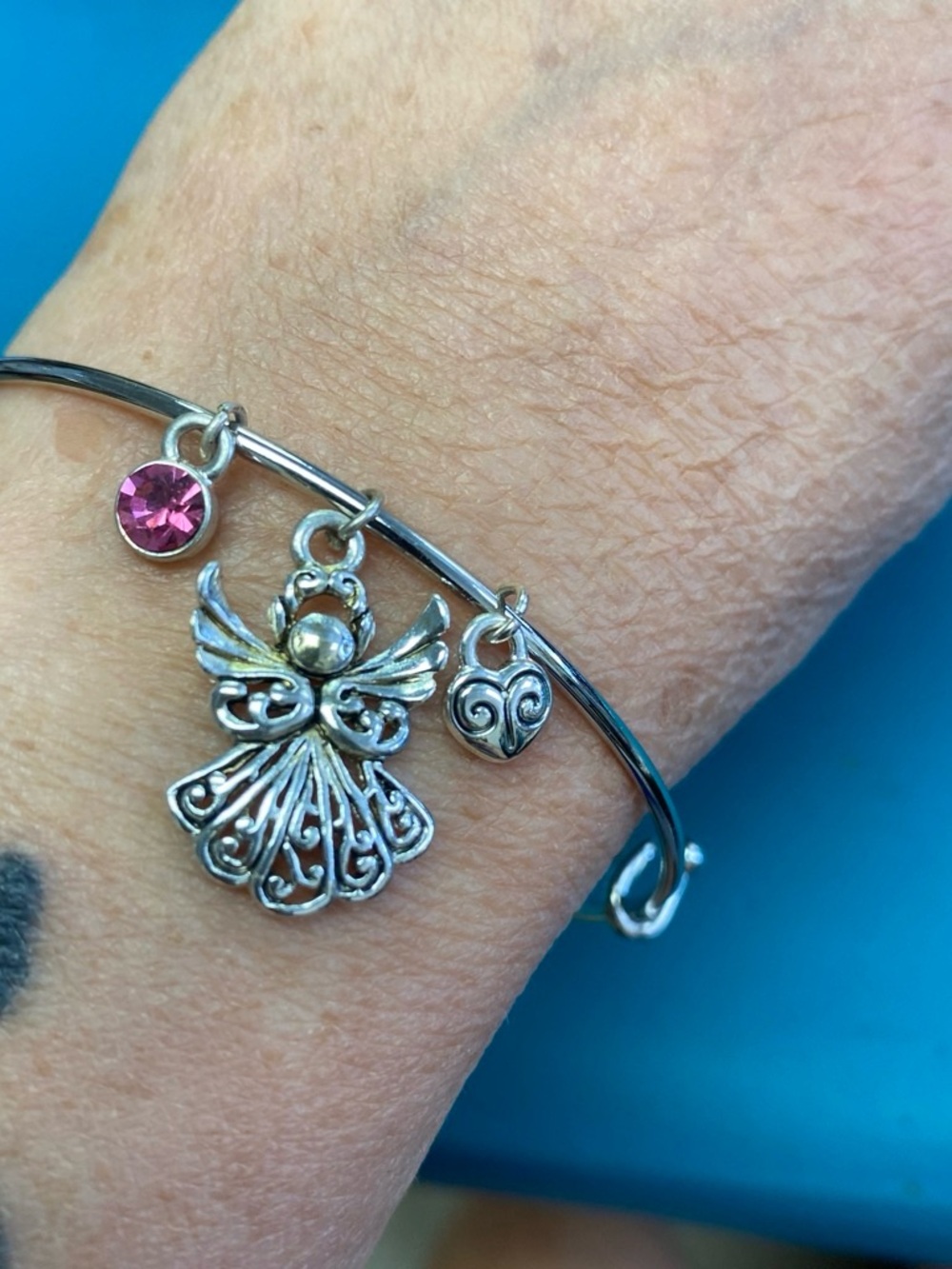 Silver Angel Charm Bangle Bracelet with Pink Crystal Accent